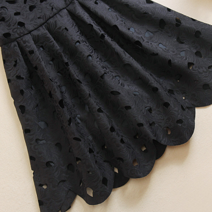 Little Black Dress With Cut Out Details